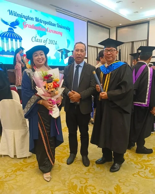 A graduate receives their award, Class of 2024